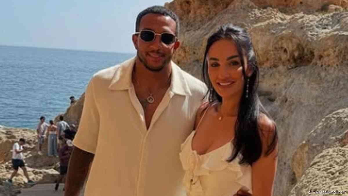 Former Premier League footballer Nathaniel Mendez-Laing, 34, charged with beating his wife as he appears in court