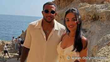 Former Premier League footballer Nathaniel Mendez-Laing, 34, charged with beating his wife as he appears in court