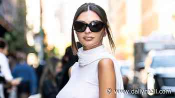 Emily Ratajkowski goes braless in a daring white top as she joins makeup free Pamela Anderson for New York Fashion Week's Calvin Klein show - amid romance with Dua Lipa's ex
