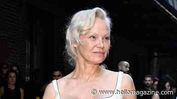 Pamela Anderson stuns in bridal figure-hugging gown