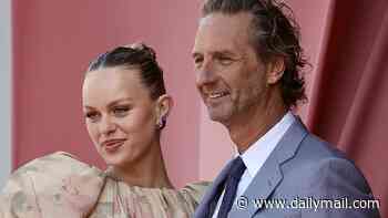Madeline Holtznagel flashes blinding diamond ring as she smooches billionaire boyfriend Justin Hemmes at ladies' luncheon in Sydney amid engagement rumours