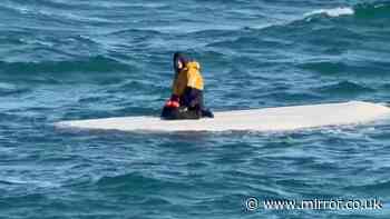 Captain's four-word take on boy, 15, found clinging to upturned boat in freezing sea for days