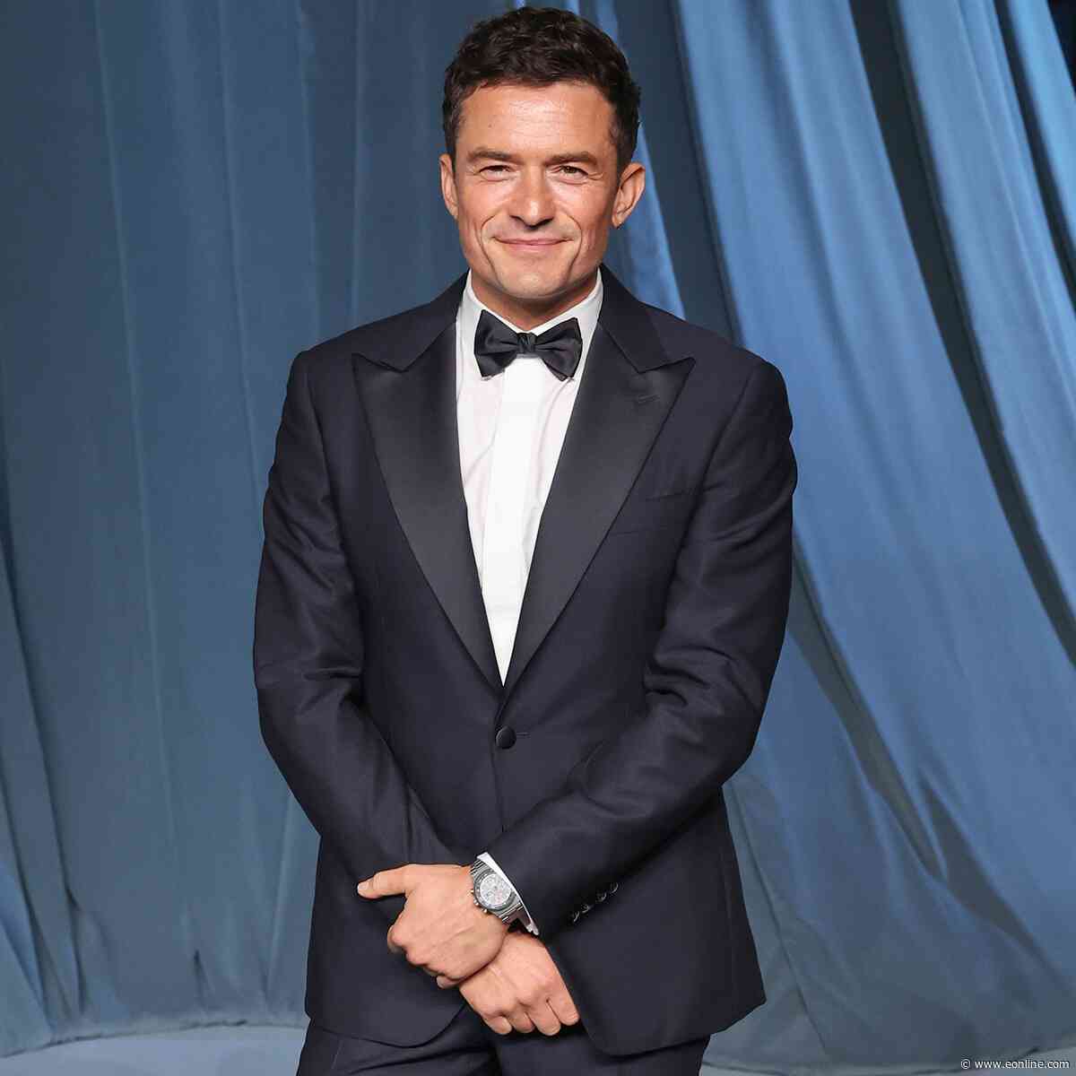 Orlando Bloom Shows Off Rock-Solid Abs During Family Getaway