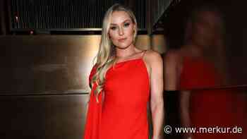 Ski-Superstar begeistert in rotem Kleid