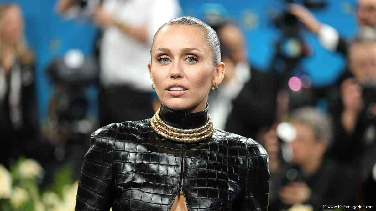 Miley Cyrus sizzles in daring 'naked' lace dress at wild party