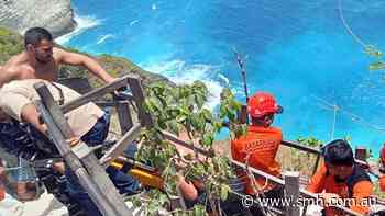 Australian tourist dies after falling from cliff at famous beach near Bali