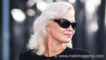 Pamela Anderson, 59, oozes gothic glamour in daring split dress and barely-there makeup