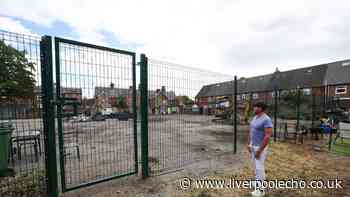 Big green fence in Hartley's Village could see owners prosecuted