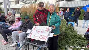 ‘One is too many’: Vigil for Alberta men sheds light on dangers of cuts to disability supports