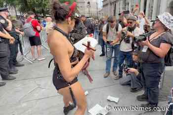 Counter-Protestor Holds Crucifix and Tears Bible Pages During 25th Anniversary 9/11 Gathering