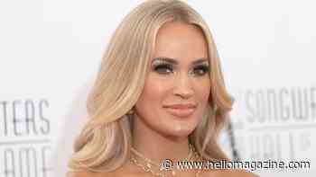 Carrie Underwood sizzles in leather mini dress as she kicks off new era