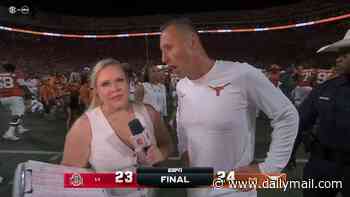 ESPN slammed for chaotic coverage of marquee college football game as reporter is forced to apologize live on air... before Texas coach's 'classless' response on field