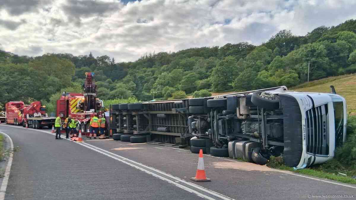 Road closed for hours as massive lorry overturns