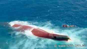 Bodies recovered as rescuers search for more than 100 missing from capsized Indonesian ferry