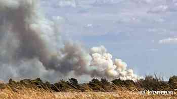 Crews battle massive fire east of Binger