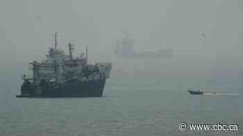 Tehran postpones regional talks; Iran media says cargo ship struck near Strait of Hormuz