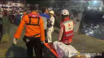 Search continues as some survivors brought ashore after Indonesia ferry overturning