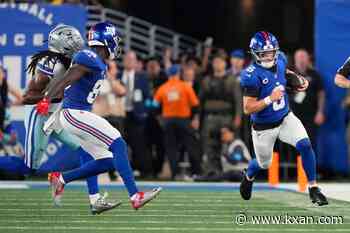 Giants' offense rolls over the Cowboys to give coach John Harbaugh a 28-20 win in his debut