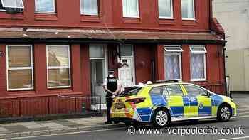 Police hunt knifemen after man, 24, stabbed inside Wallasey house