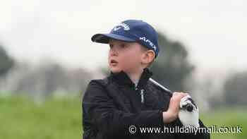George, 8, takes penalty but still wins national golf championship