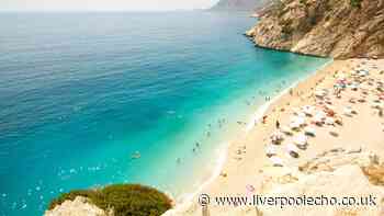 European city with beautiful sandy beaches and charming old town is 31C in September