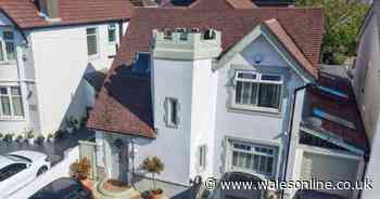 The people living in a house that looks like a castle on one of Cardiff's busiest roads