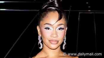 Saweetie shocks fans in a painful-looking metal thorn ensemble as she attends the Grace Ling fashion show in New York