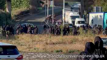 Mancunian Way: The men in black