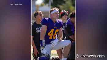 WATCH:  Dad hits the gridiron at age 48