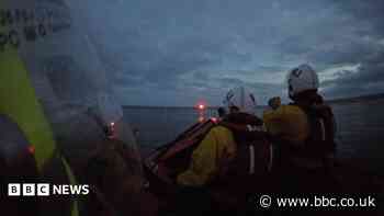 RNLI rescues two after vessel sinks near harbour