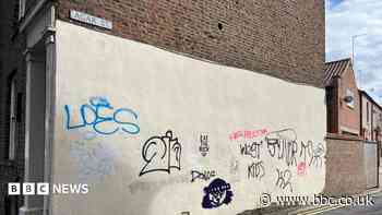 Mural plan for graffiti-tagged wall at listed site