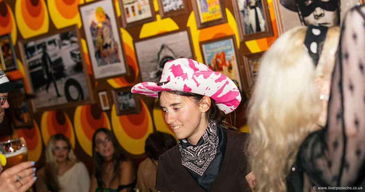 Inside two-level Liverpool dive bar with floor-fillers, jukebox and comfort food