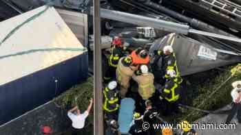Worker rescued in drill rig collapse in Brickell hugs firefighter