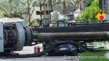 Officials say 4 people were hospitalized after a crane collapsed at a Miami construction site