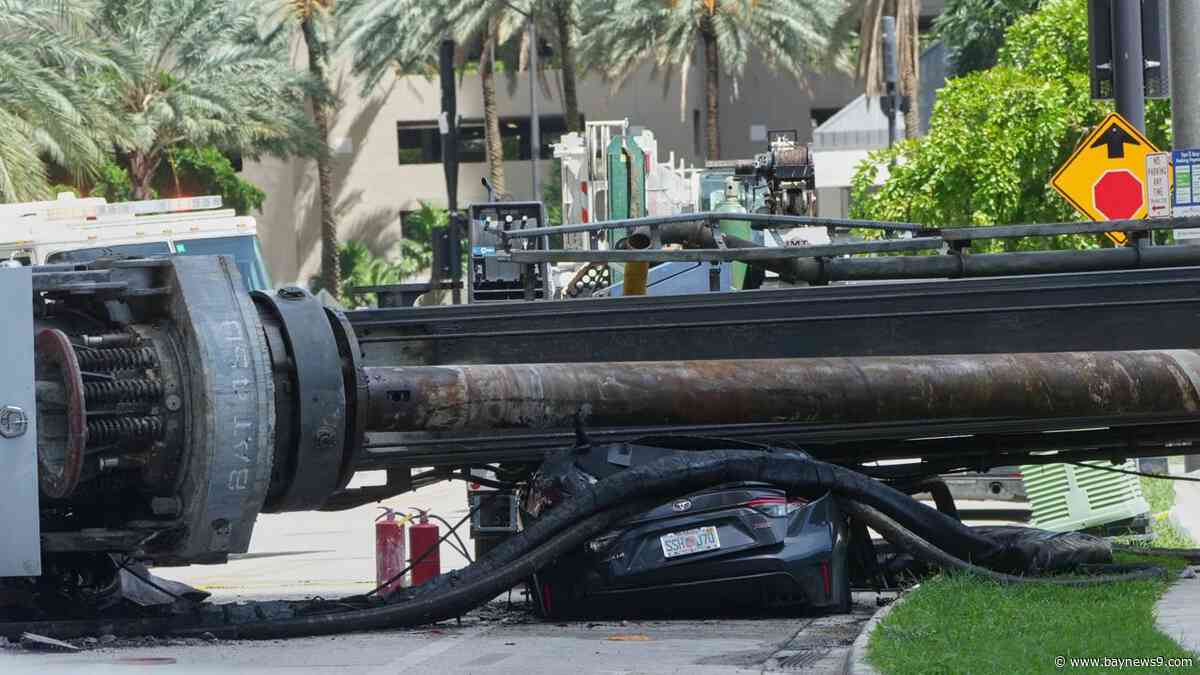 Officials say 4 people were hospitalized after a crane collapsed at a Miami construction site