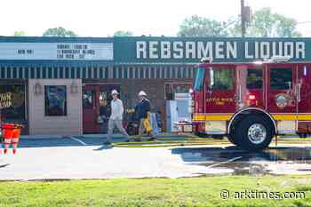 Fire trucks respond to smoldering Rebsamen Liquor call