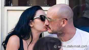 Charli XCX kisses her husband George Daniel in New York hours ahead of her gig in the city - after addressing backlash over her tour dates