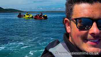 Amazing footage of dolphins approaching jet ski rider off Pembrokeshire coast