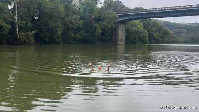 An afternoon swim: Forsyth spends lunch breaks swimming in Kentucky River