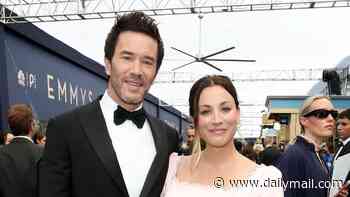 Pregnant Kaley Cuoco, 40, shows off her growing stomach as she poses with fiance Tom Pelphrey at Emmys 2026