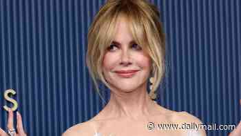 She can't keep still! Nicole Kidman pulls dramatic hand gestures at the Emmys before being told to 'zip it' while interrupting Mariska Hargitay's opening monologue