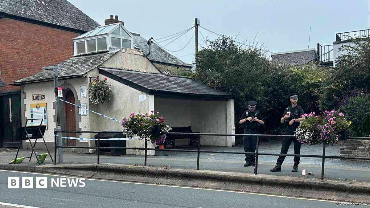 Murder arrests after man found dead in property