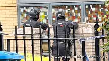 Armed police spotted outside property on Cambridge street