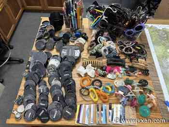 What was found among 20k pieces of trash pulled from Yellowstone hydrothermal areas