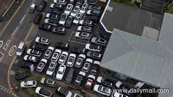 Chinese car dealership sparks parking war with locals in town after its stock overflows into the street