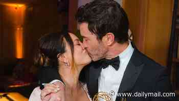 Pregnant Kaley Cuoco shares a kiss with fiancé Tom Pelphrey after his gushing Emmys acceptance speech left her in floods of tears