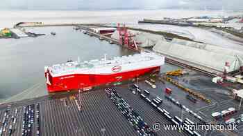 Huge shipping container carrying 7,000 electric cars docks in UK as vehicles take over town