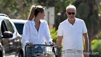 Beaming Kevin Costner, 71, spotted getting 'extremely affectionate' with mystery blonde while grocery shopping near his $145M California compound