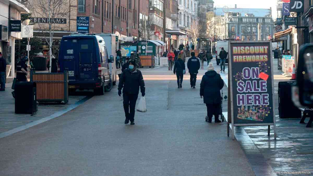 Man and woman arrested after 'lewd act' in town centre caught on camera