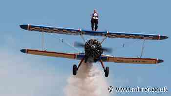 Retired nurse becomes oldest person to do the loop-the-loop as she wing walks at 97